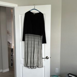 Light knit material.  Very well finished (see photo of hemline) great for work